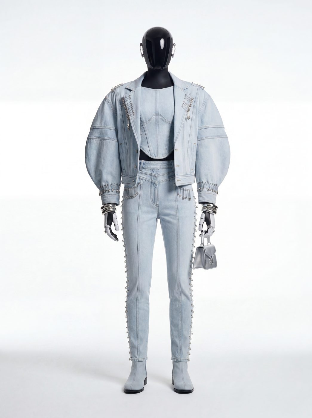 A pale denim jacket and slim trousers with a wrapped waist detail